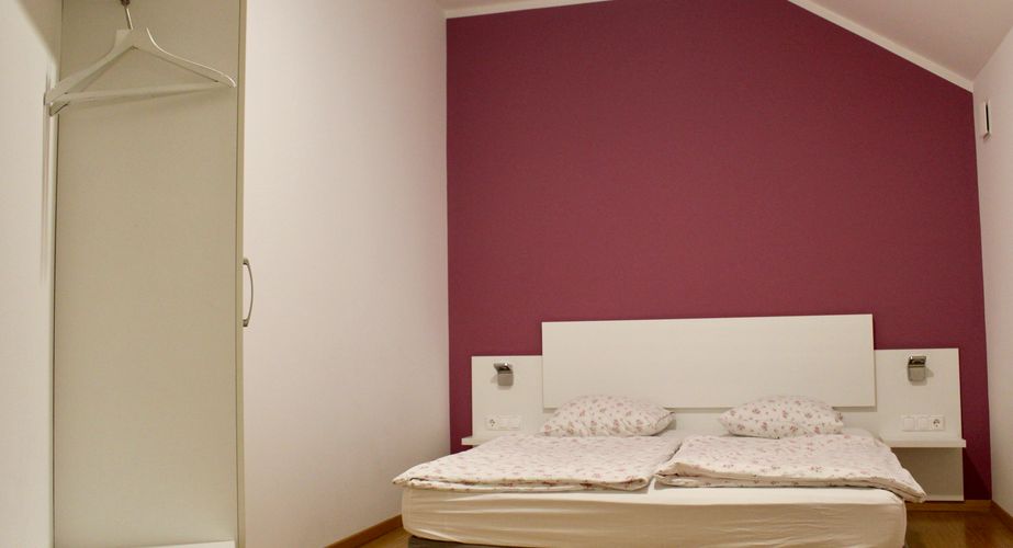 Voorbeeldappartement  Mozirje slaapkamer